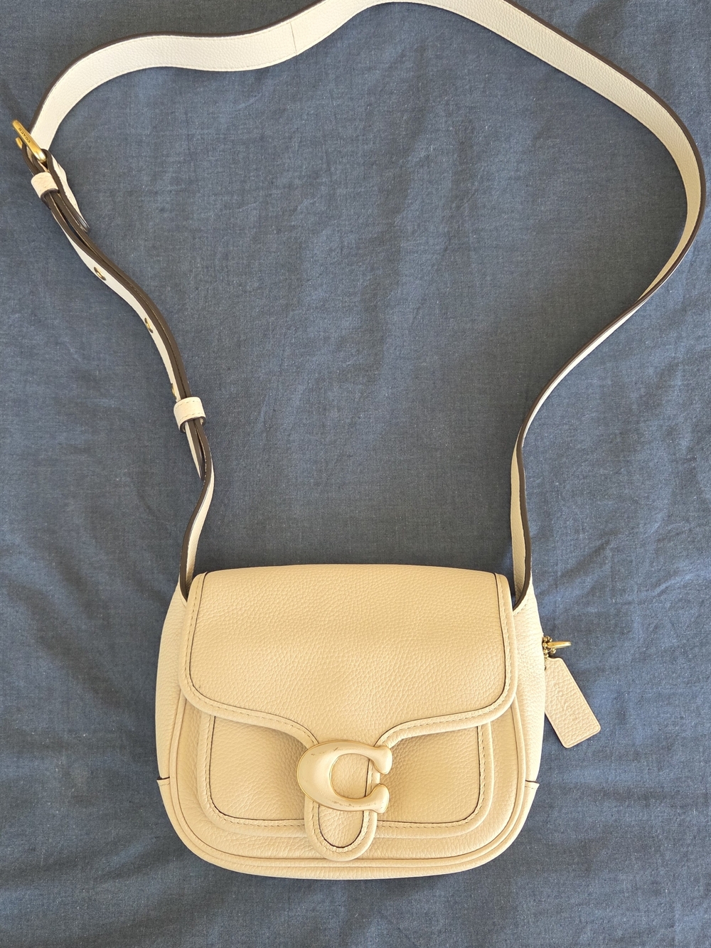Coach Pebbled Leather Cream Saddle Bag with Signature 'C' Clasp